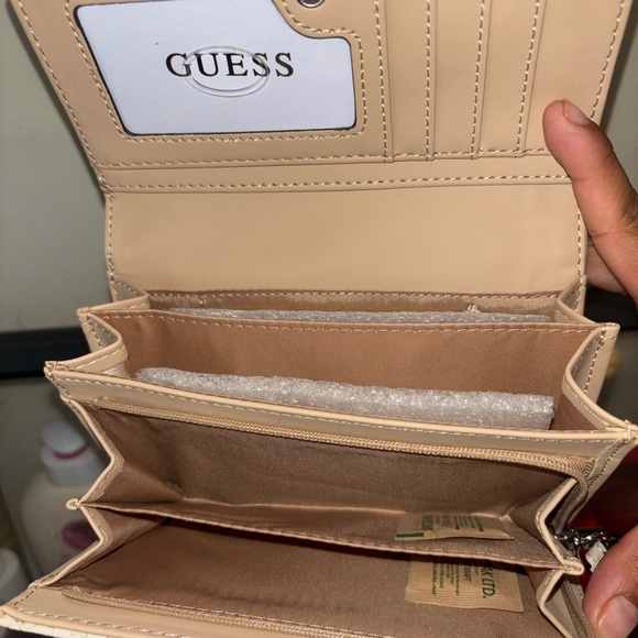 GUESS Cream Logo-Embossed Wristlet Wallet - Picture 5 of 10